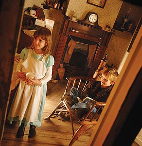 Children in vintage clothes at museum